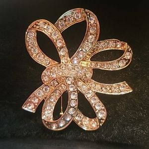Gold rhinestones bow brooch. NWOT